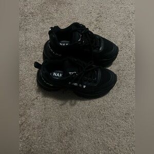 Black Sneakers with White Accents